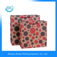 Sac en papier bon marché usine / sac à provisions / sac cadeau Huake Printing